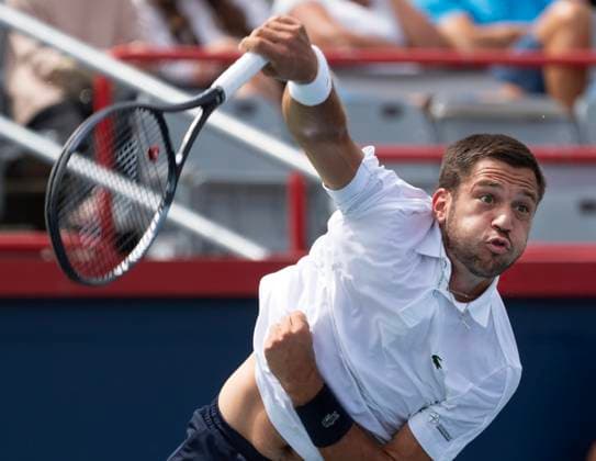 August 6, 2024, Montreal, Pq, Canada: Canada s Alexis Galarneau serves to Australia s Rinky Hijikata during their qualifying match for the National Bank Open tennis tournament, Tuesday, August 6, 2024 in Montreal. Hijikata won the match in three sets. Canada News - August 6, 2024  - ZUMAc35_ 20240806_zaf_c35_036 Copyright: xRyanxRemiorzx