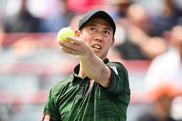 MONTREAL, QC - AUGUST 06: Kei Nishikori (JPN) serves the ball during a first round match at ATP, Tennis Herren National Bank Open on August 06, 2024 at IGA Stadium in Montreal, QC (Photo by David Kirouac Icon Sportswire) TENNIS: AUG 06 National Bank Open EDITORIAL USE ONLY Icon240806018