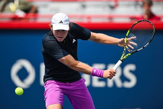 MONTREAL, QC - AUGUST 06: Alex Michelsen (USA) returns the ball during a first round match at ATP, Tennis Herren National Bank Open on August 06, 2024 at IGA Stadium in Montreal, QC (Photo by David Kirouac Icon Sportswire) TENNIS: AUG 06 National Bank Open EDITORIAL USE ONLY Icon240806022