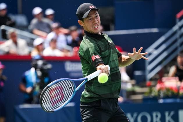 MONTREAL, QC - AUGUST 06: Kei Nishikori (JPN) returns the ball during a first round match at ATP, Tennis Herren National Bank Open on August 06, 2024 at IGA Stadium in Montreal, QC (Photo by David Kirouac Icon Sportswire) TENNIS: AUG 06 National Bank Open EDITORIAL USE ONLY Icon240806028