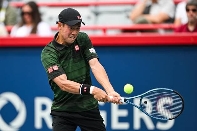 MONTREAL, QC - AUGUST 06: Kei Nishikori (JPN) returns the ball during a first round match at ATP, Tennis Herren National Bank Open on August 06, 2024 at IGA Stadium in Montreal, QC (Photo by David Kirouac Icon Sportswire) TENNIS: AUG 06 National Bank Open EDITORIAL USE ONLY Icon240806037