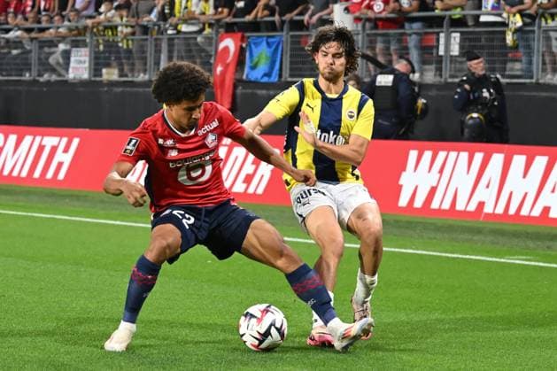 VALENCIENNES - (l-r) Tiago Carvalho Santos of Lille OSC, Ferdi Kadioglu of Fenerbahce SK during the UEFA Champions League third qualifying round between Lille OSC and Fenerbahce SK at Stade du Hainaut on August 6, 2024 in Valenciennes, France. ANP Hollandse Hoogte UEFA Champions League, Third qualifying round, 1st leg 2024 25 xVIxANPxSportx xGerritxvanxKeulenxIVx 505339731 originalFilename: 505339731.jpg