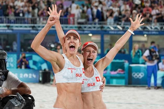 PARIS, FRANCE AUGUST 6 Tanja Hueberli of Switzerland L and Nina Brunner of Switzerland R celebrates victory and they clinch their sport for Semifinals during the Women s Quarterfinal Match 49 on day eleven of the Olympic Games Paris 2024 at on August 6, 2024 in Paris, France Paris France Copyright: xJustPictures.ch JarixPestelaccix jp-en-EuSpIm-JP4_JAR_Beachvolley_06Aug2024_PR0004
