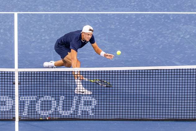 August 6, 2024, Montreal, Quebec, Canada: HOLGER RUNE from Denmark volleys near net in first set against Roberto Bautista-Agut from Spain in first round at National bank open at IGA Stadium in Montreal, Quebec, Canada on 2024-08-06 Montreal Canada - ZUMAl189 20240806_zsp_l189_039 Copyright: xYannickxLegarex