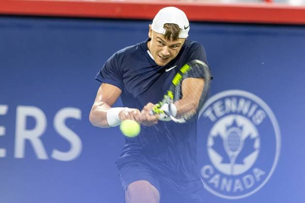 August 6, 2024, Montreal, Quebec, Canada: HOLGER RUNE from Denmark returning ball in the first set against Roberto Bautista-Agut from Spain in first round at National bank open at IGA Stadium in Montreal, Quebec, Canada on 2024-08-06 Montreal Canada - ZUMAl189 20240806_zsp_l189_042 Copyright: xYannickxLegarex