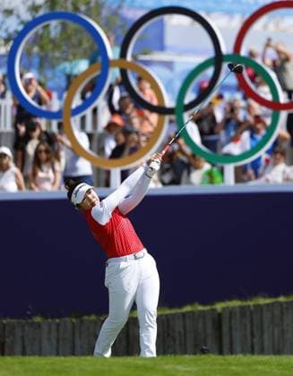 Paris Olympics: Golf Japan s Miyu Yamashita hits off the first tee during the first round of the women s golf event at the Paris Olympics on Aug. 7, 2024, at Le Golf National in Saint-Quentin-en-Yvelines, France.  A14AA0003255876P