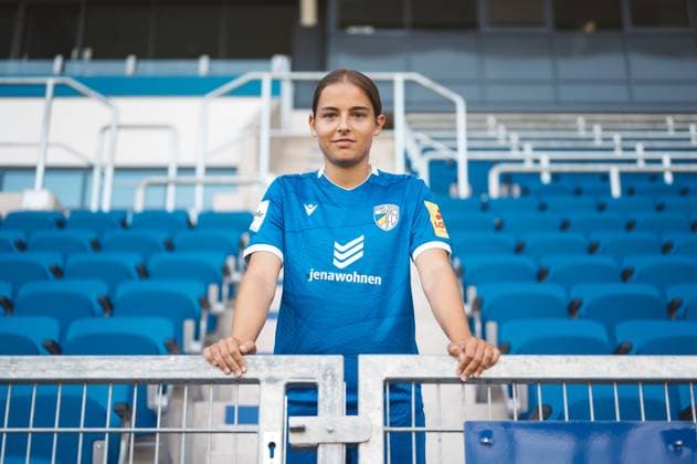 Team shooting FC Carl Zeiss Jena Women for the 2024 2025 season in the Google Pixel Womens Bundesliga on 07 08 2024 in the ad hoc Arena in the Ernst Abbe Sportfeld Jena Player Lisa Gora Jena , portrait, at the grandstand entrance ad hoc Arena in the Ernst Abbe Sportfeld