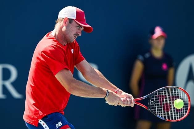 MONTREAL, QC - AUGUST 07: Tommy Paul (USA) returns the ball during a first round match at ATP, Tennis Herren National Bank Open on August 07, 2024 at IGA Stadium in Montreal, QC (Photo by David Kirouac Icon Sportswire) TENNIS: AUG 07 National Bank Open EDITORIAL USE ONLY Icon240807005