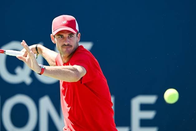 MONTREAL, QC - AUGUST 07: Tommy Paul (USA) returns the ball during a first round match at ATP, Tennis Herren National Bank Open on August 07, 2024 at IGA Stadium in Montreal, QC (Photo by David Kirouac Icon Sportswire) TENNIS: AUG 07 National Bank Open EDITORIAL USE ONLY Icon240807008