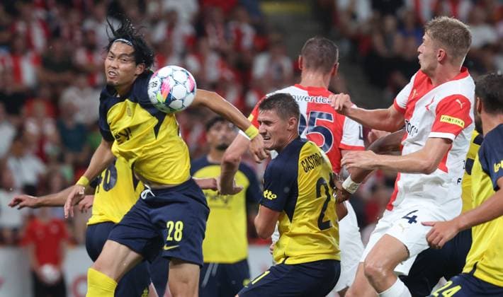 Union s Koki Machida, Slavia Prague s Tomas Chory and Union s Alessio Castro-Montes fight for the ball during a game between Czech SK Slavia Prague and Belgian soccer team Union Saint-Gilloise in Prague, Czech Republic, on Wednesday 07 August 2024, a first leg game in the third qualifying round for the UEFA Champions League competition. VIRGINIExLEFOUR  x98016879x