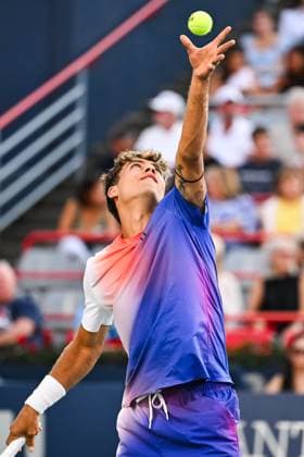 MONTREAL, QC - AUGUST 07: Flavio Cobolli (ITA) serves the ball during a first round match at ATP, Tennis Herren National Bank Open on August 07, 2024 at IGA Stadium in Montreal, QC (Photo by David Kirouac Icon Sportswire) TENNIS: AUG 07 National Bank Open EDITORIAL USE ONLY Icon240807082
