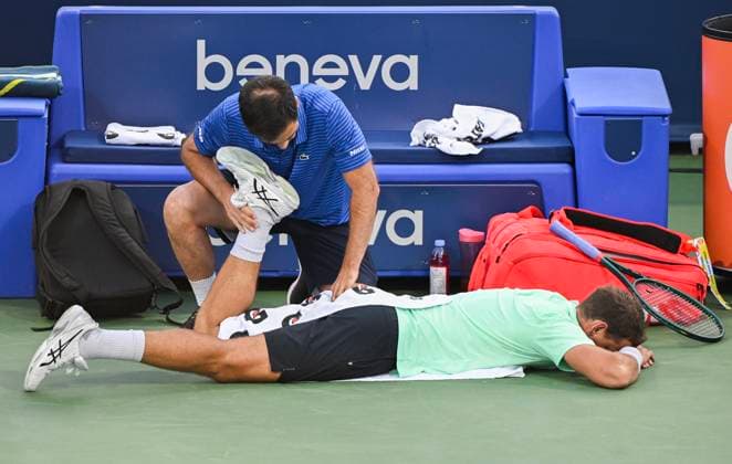 August 7, 2024, Montreal, Pq, Canada: Vasek Pospisil of Canada receives treatment from a medic during his first round match against Sebastian Korda of the United States at the National Bank Open tennis tournament in Montreal, Wednesday, August 7, 2024. Sebastian Korda, Vasek Pospisil,  - ZUMAc35_ 20240807_zaf_c35_209 Copyright: xGrahamxHughesx