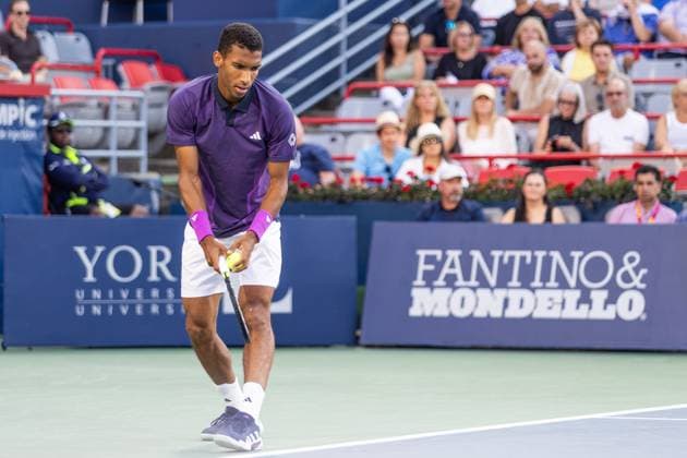 August 7, 2024, Montreal, Quebec, Canada: FELIX AUGER-ALIASSIME from Canada serving in the first set against Flavio Cobolli from Italia in first round of Canadian Open at IGA Stadium in Montreal, Quebec, Canada Montreal Canada - ZUMAl189 20240807_zsp_l189_061 Copyright: xYannickxLegarex