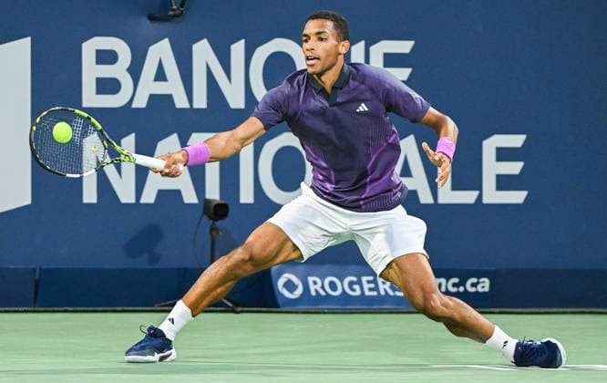 August 7, 2024, Montreal, Pq, Canada: Felix Auger-Aliassime of Canada plays a shot to Flavio Cobolli of Italy during their first round match at the National Bank Open tennis tournament in Montreal, Wednesday, August 7, 2024. Flavio Cobolli, Félix Auger-Aliassime,  - ZUMAc35_ 20240807_zaf_c35_242 Copyright: xGrahamxHughesx