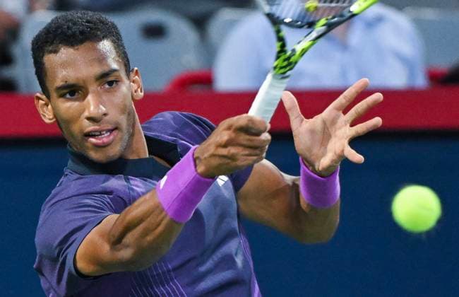 August 7, 2024, Montreal, Pq, Canada: Felix Auger-Aliassime of Canada plays a shot to Flavio Cobolli of Italy during their first round match at the National Bank Open tennis tournament in Montreal, Wednesday, August 7, 2024. Flavio Cobolli, Félix Auger-Aliassime,  - ZUMAc35_ 20240807_zaf_c35_248 Copyright: xGrahamxHughesx
