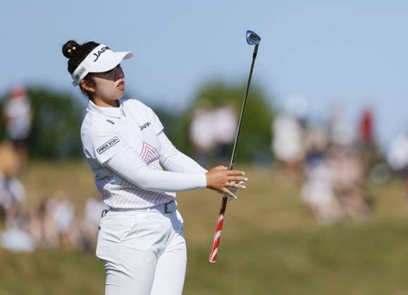 Paris Olympics: Golf Japan s Miyu Yamashita watches her tee shot on the second hole during the second round of the women s golf event at the Paris Olympics on Aug. 8, 2024, at Le Golf National in Saint-Quentin-en-Yvelines, France.  A14AA0003261028P