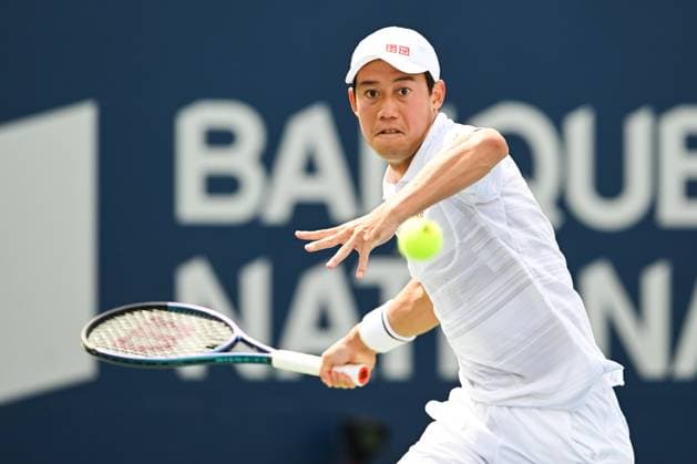 MONTREAL, QC - AUGUST 08: Kei Nishikori (JPN) returns the ball during a second round match at ATP, Tennis Herren National Bank Open on August 08, 2024 at IGA Stadium in Montreal, QC (Photo by David Kirouac Icon Sportswire) TENNIS: AUG 08 National Bank Open EDITORIAL USE ONLY Icon240808002