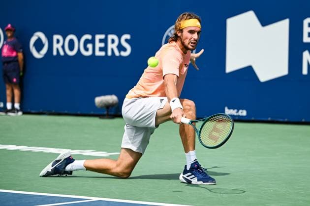 MONTREAL, QC - AUGUST 08: Stefanos Tsitsipas (GRE) returns the ball during a second round match at ATP, Tennis Herren National Bank Open on August 08, 2024 at IGA Stadium in Montreal, QC (Photo by David Kirouac Icon Sportswire) TENNIS: AUG 08 National Bank Open EDITORIAL USE ONLY Icon240808005