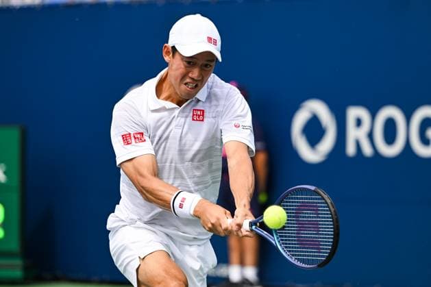 MONTREAL, QC - AUGUST 08: Kei Nishikori (JPN) returns the ball during a second round match at ATP, Tennis Herren National Bank Open on August 08, 2024 at IGA Stadium in Montreal, QC (Photo by David Kirouac Icon Sportswire) TENNIS: AUG 08 National Bank Open EDITORIAL USE ONLY Icon240808008