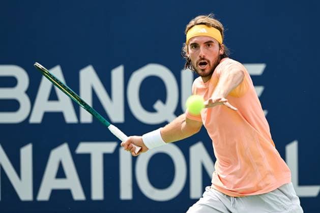 MONTREAL, QC - AUGUST 08: Stefanos Tsitsipas (GRE) returns the ball during a second round match at ATP, Tennis Herren National Bank Open on August 08, 2024 at IGA Stadium in Montreal, QC (Photo by David Kirouac Icon Sportswire) TENNIS: AUG 08 National Bank Open EDITORIAL USE ONLY Icon240808014