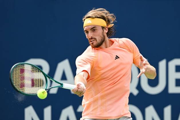 MONTREAL, QC - AUGUST 08: Stefanos Tsitsipas (GRE) returns the ball during a second round match at ATP, Tennis Herren National Bank Open on August 08, 2024 at IGA Stadium in Montreal, QC (Photo by David Kirouac Icon Sportswire) TENNIS: AUG 08 National Bank Open EDITORIAL USE ONLY Icon240808015