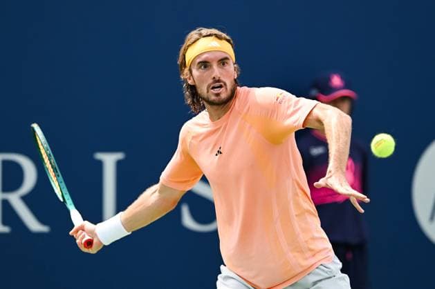 MONTREAL, QC - AUGUST 08: Stefanos Tsitsipas (GRE) returns the ball during a second round match at ATP, Tennis Herren National Bank Open on August 08, 2024 at IGA Stadium in Montreal, QC (Photo by David Kirouac Icon Sportswire) TENNIS: AUG 08 National Bank Open EDITORIAL USE ONLY Icon240808016