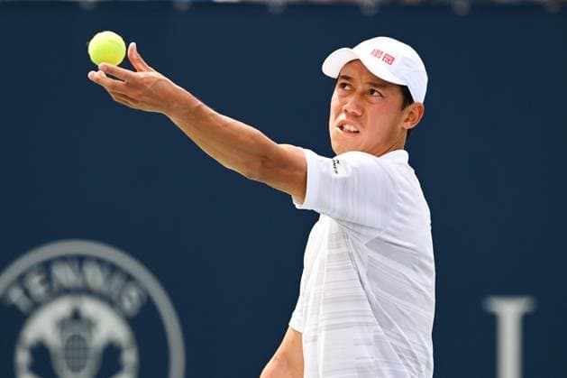 MONTREAL, QC - AUGUST 08: Kei Nishikori (JPN) serves the ball during a second round match at ATP, Tennis Herren National Bank Open on August 08, 2024 at IGA Stadium in Montreal, QC (Photo by David Kirouac Icon Sportswire) TENNIS: AUG 08 National Bank Open EDITORIAL USE ONLY Icon240808020