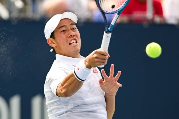 MONTREAL, QC - AUGUST 08: Kei Nishikori (JPN) returns the ball during a second round match at ATP, Tennis Herren National Bank Open on August 08, 2024 at IGA Stadium in Montreal, QC (Photo by David Kirouac Icon Sportswire) TENNIS: AUG 08 National Bank Open EDITORIAL USE ONLY Icon240808021