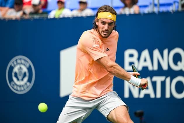 MONTREAL, QC - AUGUST 08: Stefanos Tsitsipas (GRE) returns the ball during a second round match at ATP, Tennis Herren National Bank Open on August 08, 2024 at IGA Stadium in Montreal, QC (Photo by David Kirouac Icon Sportswire) TENNIS: AUG 08 National Bank Open EDITORIAL USE ONLY Icon240808024