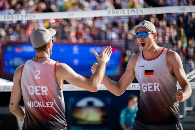 240808 Nils Ehlers and Clemens Wickler of Germany celebrate in a men s beach volleyball semifinal match between Germany and Norway during day 13 of the Paris 2024 Olympics on August 8, 2024 in Paris Photo Jon Olav Nesvold BILDBYRAN COP 217 JE0103 beachvolleyboll beach volleyball sandvolleyball paris 2024 olympics day 13 germany norway bbeng jubel  Copyright: JONxOLAVxNESVOLD BB240808JE069