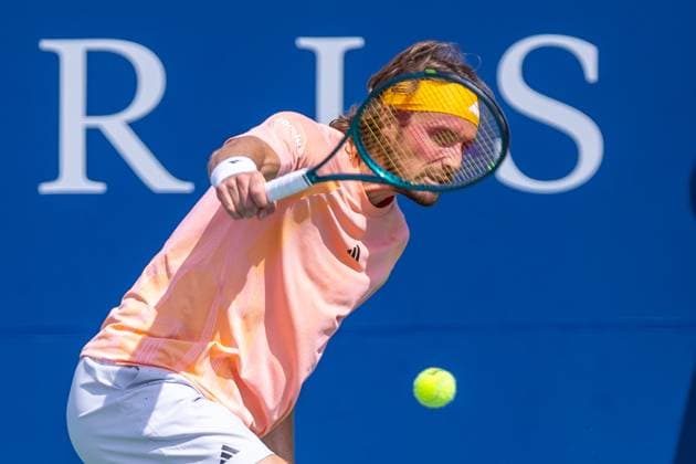 August 8, 2024, Montreal, Quebec, Canada: STEFANOS TSITSIPAS from Greece returning ball in first set against Kei Nishikori from Japan in second round of Canadian Open at IGA Stadium in Montreal, Quebec, Canada Montreal Canada - ZUMAl189 20240808_zsp_l189_004 Copyright: xYannickxLegarex