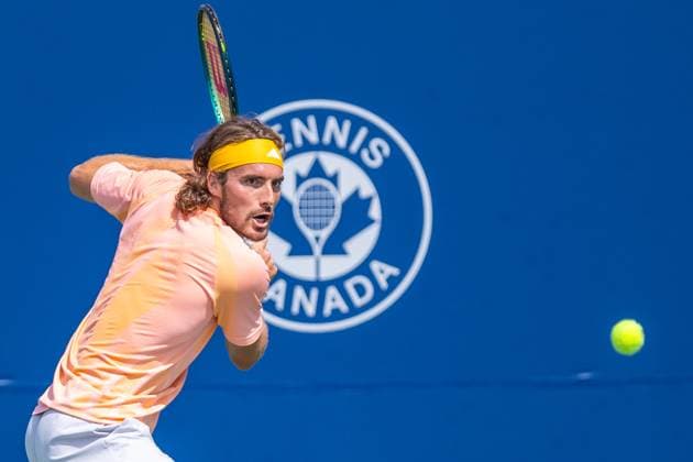 August 8, 2024, Montreal, Quebec, Canada: STEFANOS TSITSIPAS from Greece returning ball in first set against Kei Nishikori from Japan in second round of Canadian Open at IGA Stadium in Montreal, Quebec, Canada Montreal Canada - ZUMAl189 20240808_zsp_l189_005 Copyright: xYannickxLegarex