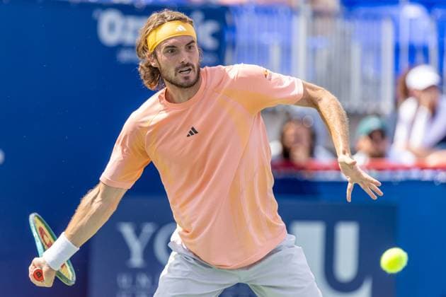 August 8, 2024, Montreal, Quebec, Canada: STEFANOS TSITSIPAS from Greece returning ball in first set against Kei Nishikori from Japan in second round of Canadian Open at IGA Stadium in Montreal, Quebec, Canada Montreal Canada - ZUMAl189 20240808_zsp_l189_008 Copyright: xYannickxLegarex