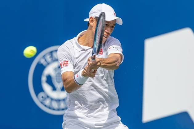 August 8, 2024, Montreal, Quebec, Canada: KEI NISHIKORI from Japan returning ball in first set against Stefanos Tsitsipas from Greece in second round of Canadian Open at IGA Stadium in Montreal, Quebec, Canada Montreal Canada - ZUMAl189 20240808_zsp_l189_011 Copyright: xYannickxLegarex