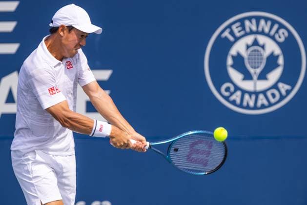 August 8, 2024, Montreal, Quebec, Canada: KEI NISHIKORI from Japan returning ball in first set against Stefanos Tsitsipas from Greece in second round of Canadian Open at IGA Stadium in Montreal, Quebec, Canada Montreal Canada - ZUMAl189 20240808_zsp_l189_023 Copyright: xYannickxLegarex