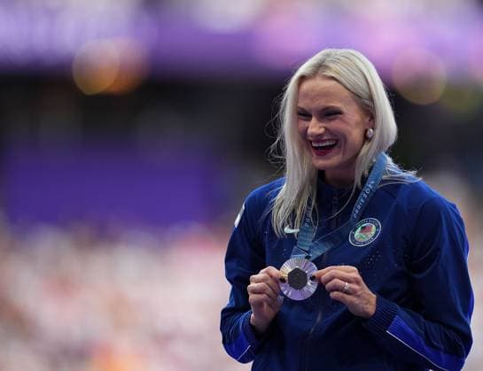 (240808) -- PARIS, Aug. 8, 2024 -- Silver medalist Katie Moon of the United States reacts during the victory ceremony of the women s pole vault of Athletics at the Paris 2024 Olympic Games, Olympische Spiele, Olympia, OS in Paris, France, Aug. 8, 2024. ) (PARIS2024) FRANCE-PARIS-OLY-ATHLETICS-POLE VAULT-WOMEN XuxChang 