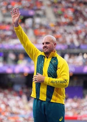 (240808) -- PARIS, Aug. 8, 2024 -- Bronze medalist Matthew Denny of Australia reacts during the victory ceremony of the men s discus throw of Athletics at the Paris 2024 Olympic Games, Olympische Spiele, Olympia, OS in Paris, France, Aug. 8, 2024. ) (PARIS2024) FRANCE-PARIS-OLY-ATHLETICS-DISCUS THROW-MEN XuxChang 