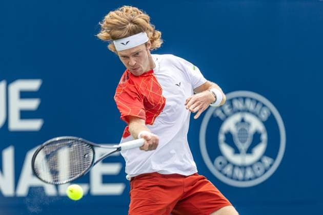 August 8, 2024, Montreal, Quebec, Canada: ANDREY RUBLEV returning ball in first set against Tomas Martin Etcheverry from Argentina in second round of Canadian Open at IGA Stadium in Montreal, Quebec, Canada Montreal Canada - ZUMAl189 20240808_zsp_l189_032 Copyright: xYannickxLegarex