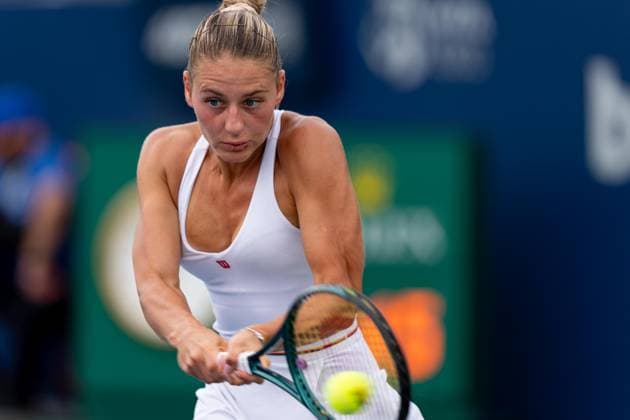 TORONTO, ON - AUGUST 08: Marta Kostyuk of Ukraine hits a shot during her second round match of the National Bank Open, part of the WTA, Tennis Damen Tour, at Sobeys Stadium on August 8, 2024 in Toronto, Canada. (Photo by Julian Avram Icon Sportswire) TENNIS: AUG 08 National Bank Open EDITORIAL USE ONLY Icon2408080014