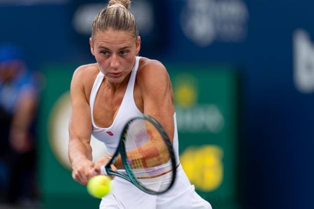 TORONTO, ON - AUGUST 08: Marta Kostyuk of Ukraine hits a shot during her second round match of the National Bank Open, part of the WTA, Tennis Damen Tour, at Sobeys Stadium on August 8, 2024 in Toronto, Canada. (Photo by Julian Avram Icon Sportswire) TENNIS: AUG 08 National Bank Open EDITORIAL USE ONLY Icon2408080015
