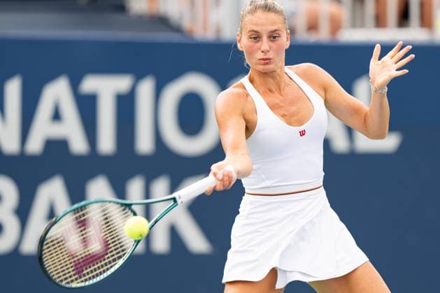 TORONTO, ON - AUGUST 08: Marta Kostyuk of Ukraine hits a shot during her second round match of the National Bank Open, part of the WTA, Tennis Damen Tour, at Sobeys Stadium on August 8, 2024 in Toronto, Canada. (Photo by Julian Avram Icon Sportswire) TENNIS: AUG 08 National Bank Open EDITORIAL USE ONLY Icon2408080023