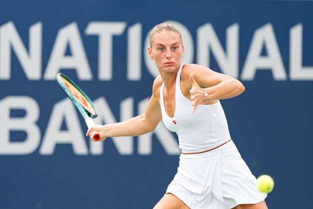 TORONTO, ON - AUGUST 08: Marta Kostyuk of Ukraine hits a shot during her second round match of the National Bank Open, part of the WTA, Tennis Damen Tour, at Sobeys Stadium on August 8, 2024 in Toronto, Canada. (Photo by Julian Avram Icon Sportswire) TENNIS: AUG 08 National Bank Open EDITORIAL USE ONLY Icon2408080026