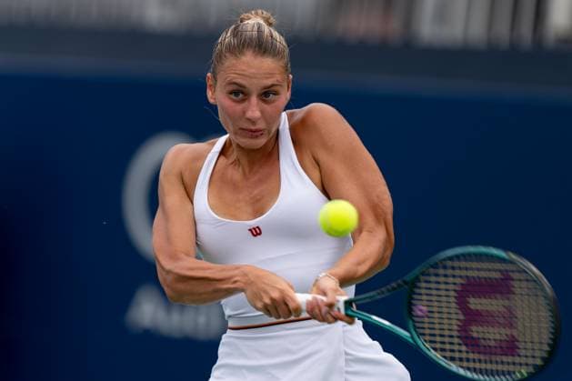 TORONTO, ON - AUGUST 08: Marta Kostyuk of Ukraine hits a shot during her second round match of the National Bank Open, part of the WTA, Tennis Damen Tour, at Sobeys Stadium on August 8, 2024 in Toronto, Canada. (Photo by Julian Avram Icon Sportswire) TENNIS: AUG 08 National Bank Open EDITORIAL USE ONLY Icon2408080091