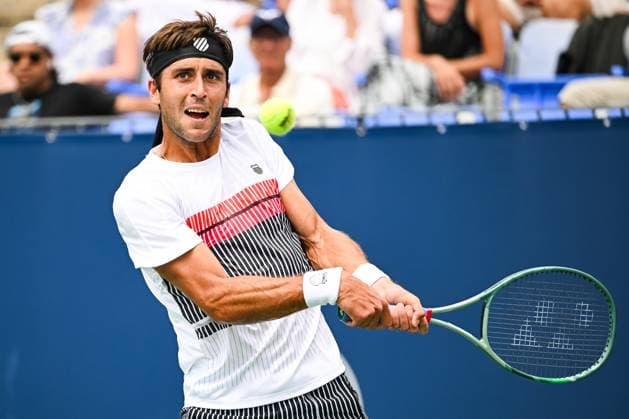 MONTREAL, QC - AUGUST 08: Tomas Martin Etcheverry (ARG) returns the ball during a second round match at ATP, Tennis Herren National Bank Open on August 08, 2024 at IGA Stadium in Montreal, QC (Photo by David Kirouac Icon Sportswire) TENNIS: AUG 08 National Bank Open EDITORIAL USE ONLY Icon240808034