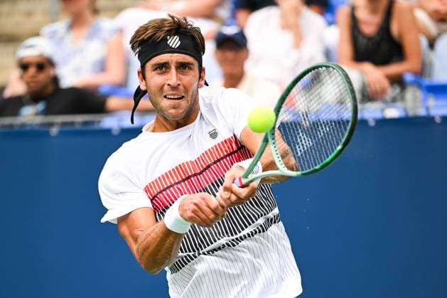 MONTREAL, QC - AUGUST 08: Tomas Martin Etcheverry (ARG) returns the ball during a second round match at ATP, Tennis Herren National Bank Open on August 08, 2024 at IGA Stadium in Montreal, QC (Photo by David Kirouac Icon Sportswire) TENNIS: AUG 08 National Bank Open EDITORIAL USE ONLY Icon240808035