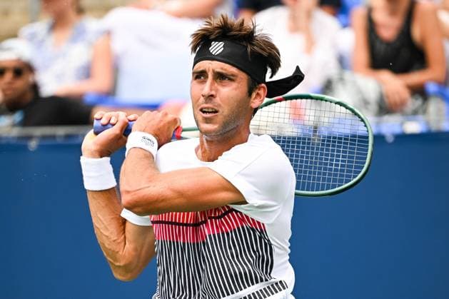 MONTREAL, QC - AUGUST 08: Tomas Martin Etcheverry (ARG) returns the ball during a second round match at ATP, Tennis Herren National Bank Open on August 08, 2024 at IGA Stadium in Montreal, QC (Photo by David Kirouac Icon Sportswire) TENNIS: AUG 08 National Bank Open EDITORIAL USE ONLY Icon240808036