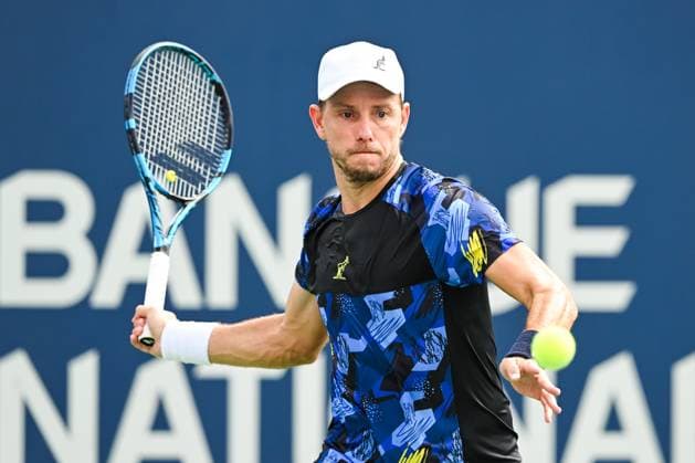 MONTREAL, QC - AUGUST 08: James Duckworth (AUS) returns the ball during a second round match at ATP, Tennis Herren National Bank Open on August 08, 2024 at IGA Stadium in Montreal, QC (Photo by David Kirouac Icon Sportswire) TENNIS: AUG 08 National Bank Open EDITORIAL USE ONLY Icon240808045