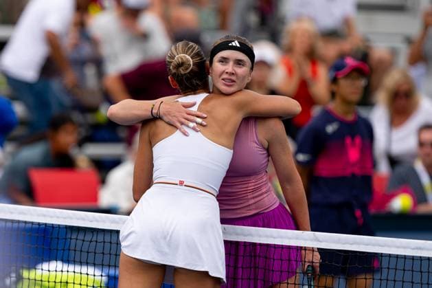 TORONTO, ON - AUGUST 08: Elina Svitolina of Ukraine congratulates Marta Kostyuk of Ukraine on the win after their second round match of the National Bank Open, part of the WTA, Tennis Damen Tour, at Sobeys Stadium on August 8, 2024 in Toronto, Canada. (Photo by Julian Avram Icon Sportswire) TENNIS: AUG 08 National Bank Open EDITORIAL USE ONLY Icon2408080125