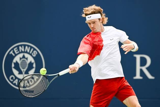 MONTREAL, QC - AUGUST 08: Andrey Rublev returns the ball during a second round match at ATP, Tennis Herren National Bank Open on August 08, 2024 at IGA Stadium in Montreal, QC (Photo by David Kirouac Icon Sportswire) TENNIS: AUG 08 National Bank Open EDITORIAL USE ONLY Icon240808026