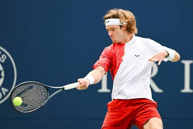 MONTREAL, QC - AUGUST 08: Andrey Rublev returns the ball during a second round match at ATP, Tennis Herren National Bank Open on August 08, 2024 at IGA Stadium in Montreal, QC (Photo by David Kirouac Icon Sportswire) TENNIS: AUG 08 National Bank Open EDITORIAL USE ONLY Icon240808028